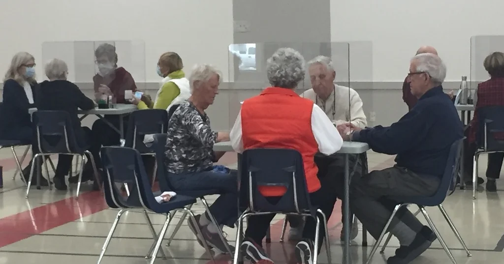 Seniors playing cards at the Herman Prior Activity centre